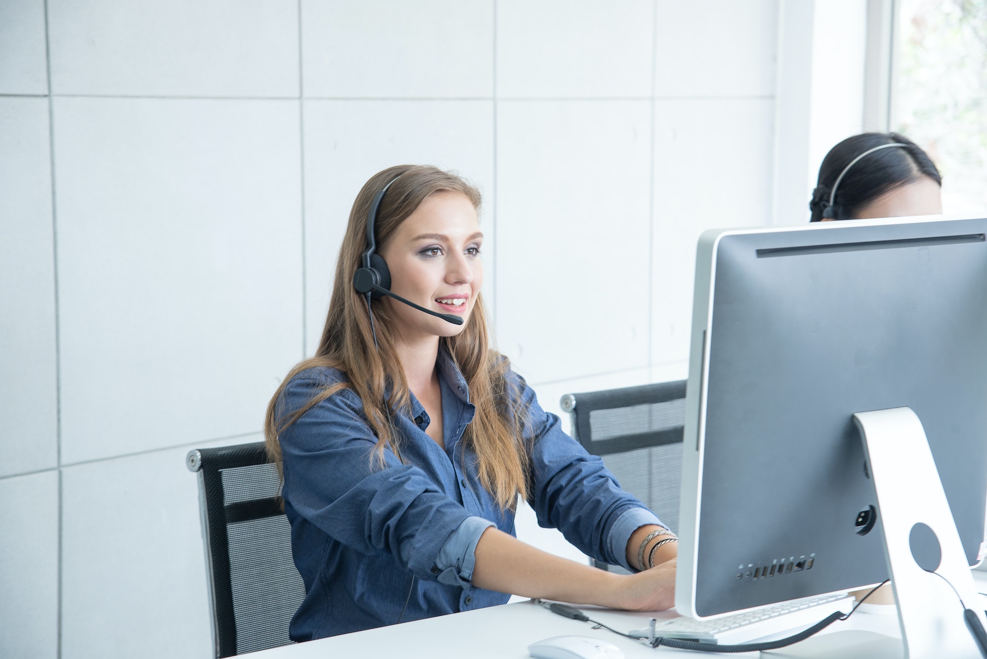 woman Call center service customer support or sales agent give advice and help solve problems