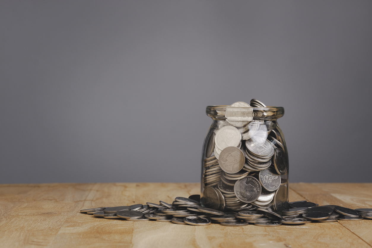 Coins in a glass jar