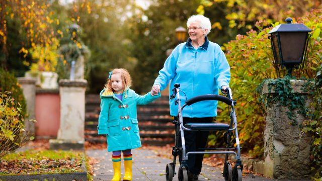 Grandmother Holding Granddaughter's Hand