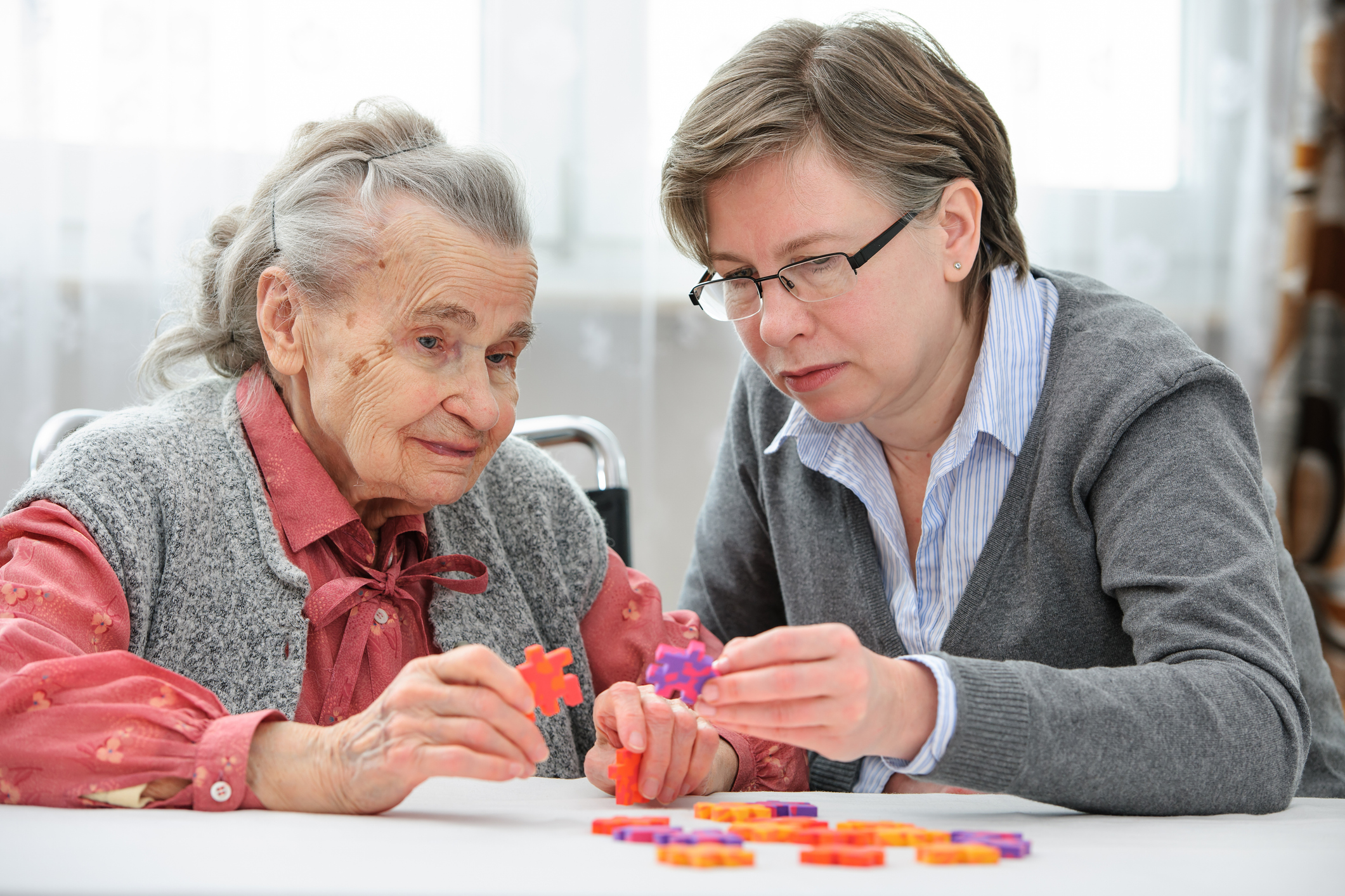 Senior woman with her care nurse